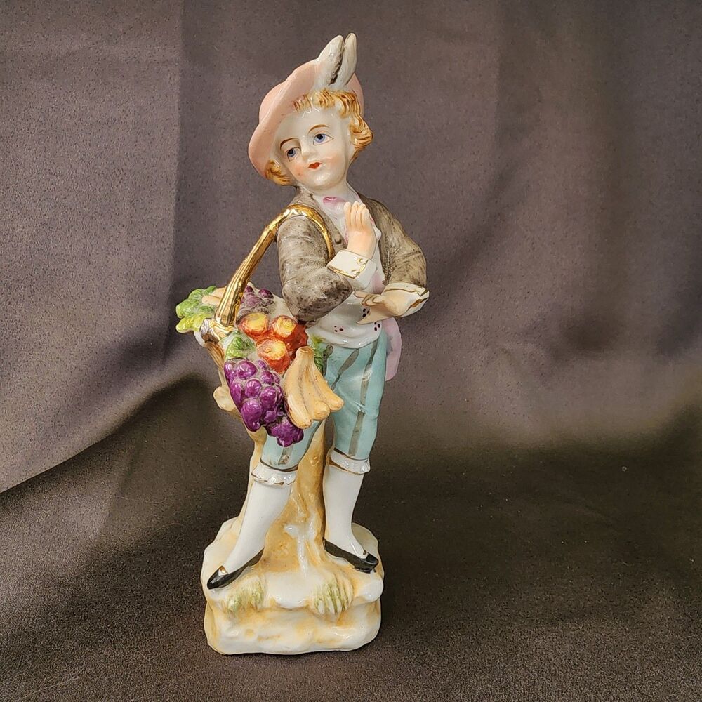 Vintage UCAGCO 7-1/2" Tall Figurine Boy Carrying Fruit Basket Made in Japan